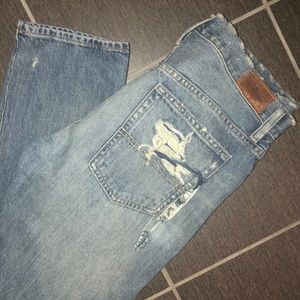 Distressed denim boyfriend skinny jean